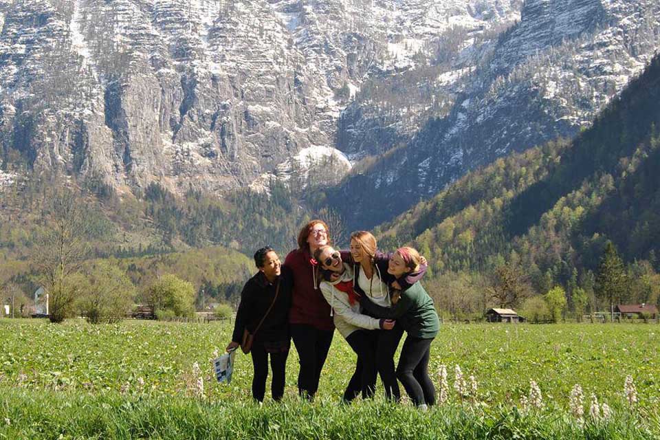 Students in front of mountains