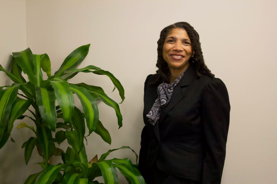 Professor Griggs poses in Scott Hall Professor Griggs poses in Scott Hall